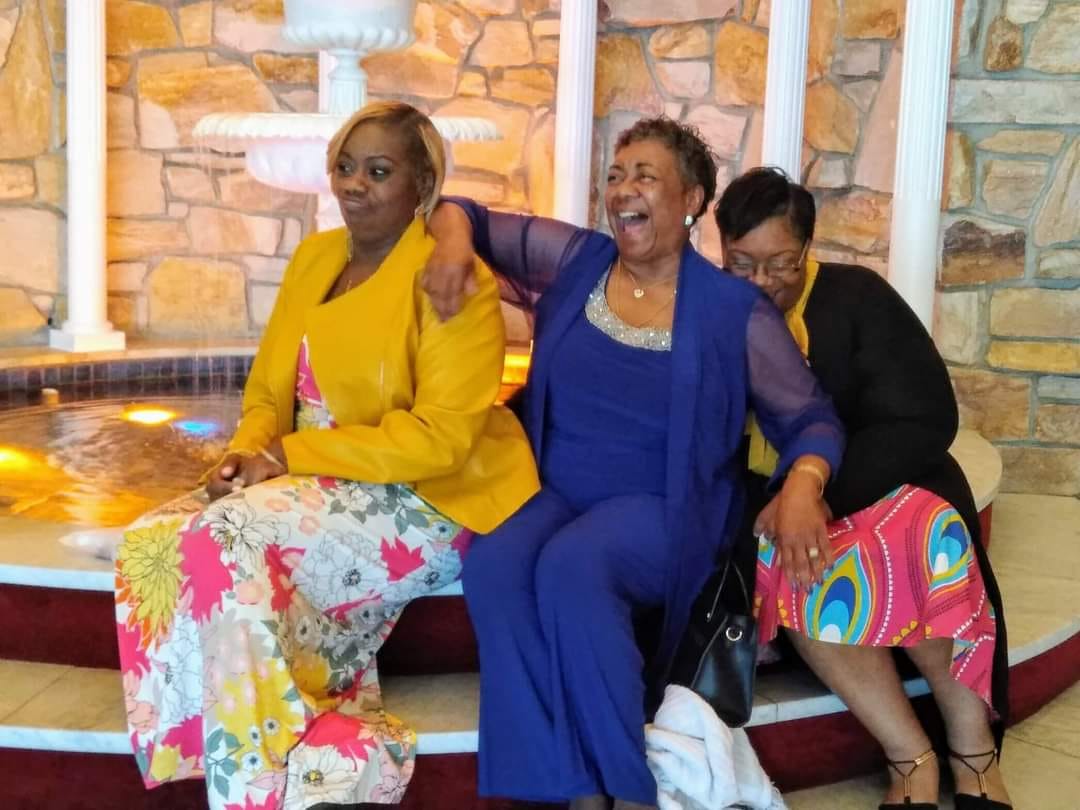 Rev. Major L. Certain with her daughters